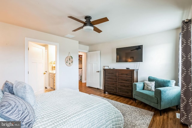 bedroom with ceiling fan, wood finished floors, and visible vents