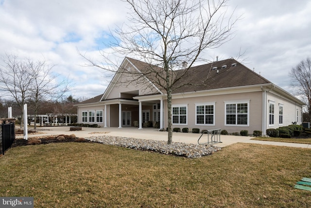 back of house with a yard, central AC, and a patio