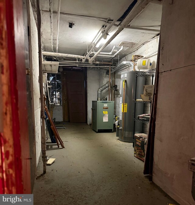 332 Emerson St NW, Washington, DC 20011 - unfinished basement with water heater