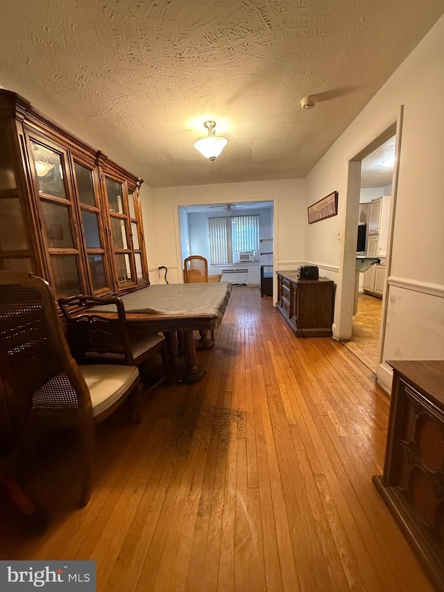 332 Emerson St NW, Washington, DC 20011 - dining space with wood-type flooring and a textured ceiling
