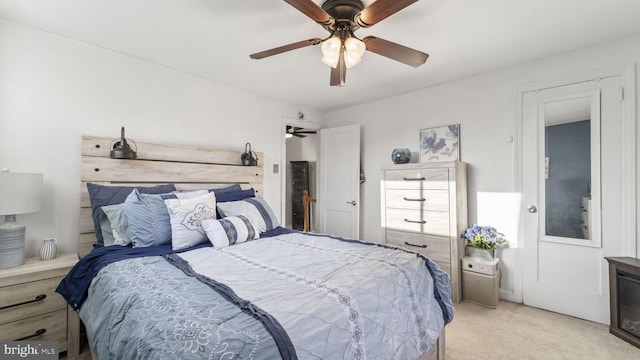 bedroom featuring light carpet and ceiling fan