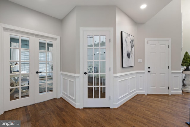 doorway featuring recessed lighting, french doors, a wainscoted wall, and wood finished floors