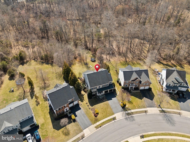 birds eye view of property with a residential view