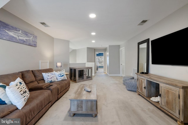 living area featuring light carpet, visible vents, recessed lighting, and baseboards