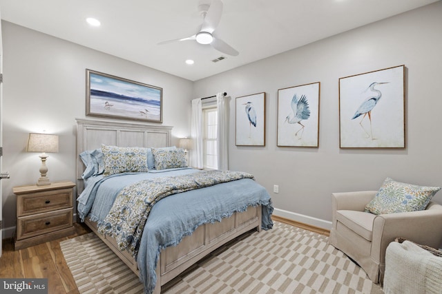 bedroom featuring light wood-style flooring, recessed lighting, baseboards, and visible vents