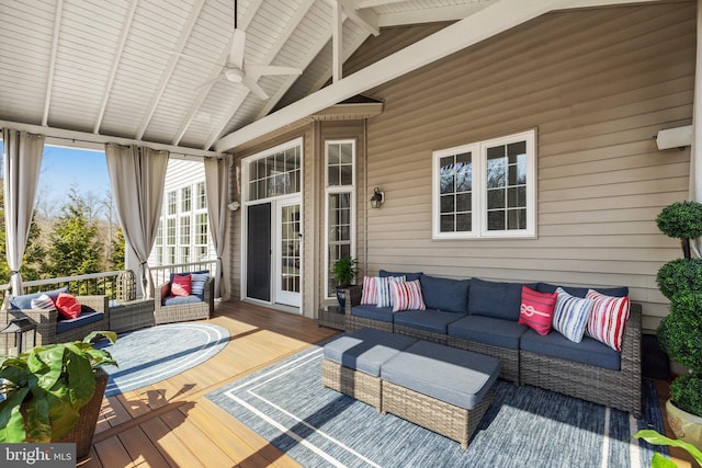 deck with an outdoor hangout area and ceiling fan