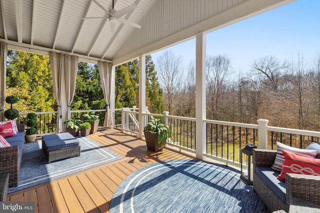 wooden terrace featuring a ceiling fan and an outdoor hangout area