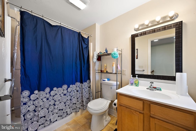 bathroom featuring tile patterned flooring, visible vents, vanity, and toilet