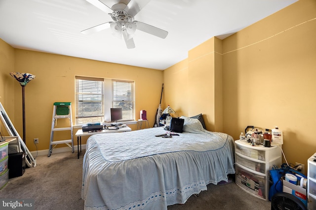 bedroom with ceiling fan, carpet floors, and baseboards