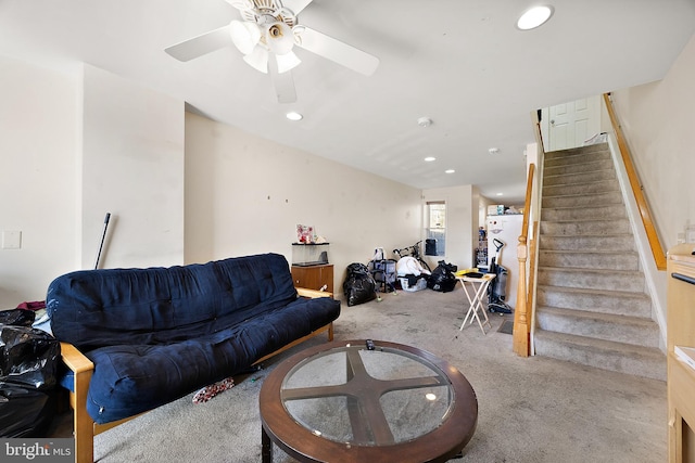 carpeted living room with stairway, a ceiling fan, and recessed lighting