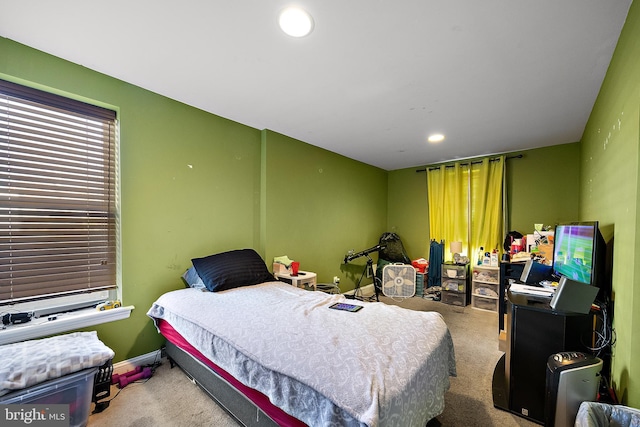 carpeted bedroom with recessed lighting and baseboards