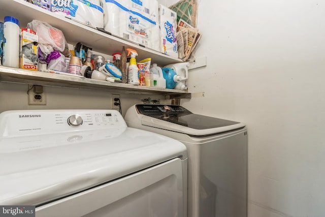 laundry room featuring laundry area and separate washer and dryer