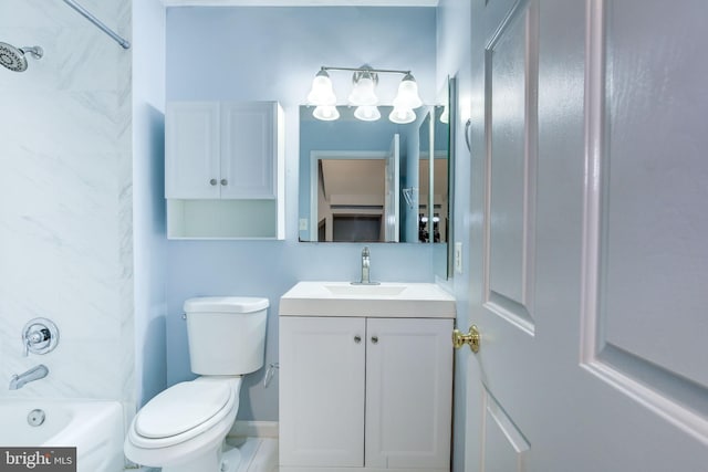 bathroom with toilet, shower / tub combination, and vanity