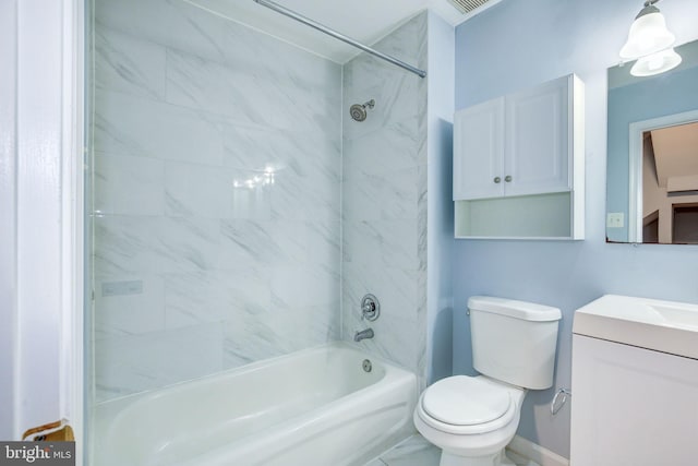 full bath featuring visible vents, baseboards, toilet, vanity, and washtub / shower combination