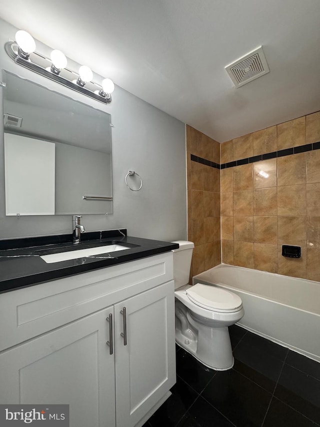 full bath featuring tile patterned floors, visible vents, toilet, and vanity