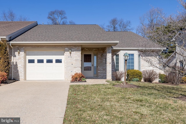 ranch-style house featuring concrete driveway, a front lawn, a garage, and a shingled roof