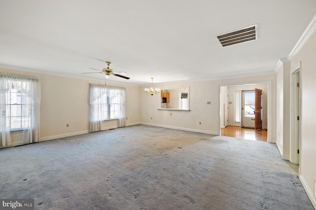 unfurnished living room featuring light carpet, visible vents, baseboards, and ornamental molding