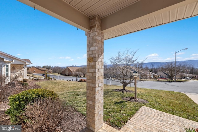 view of yard with a residential view