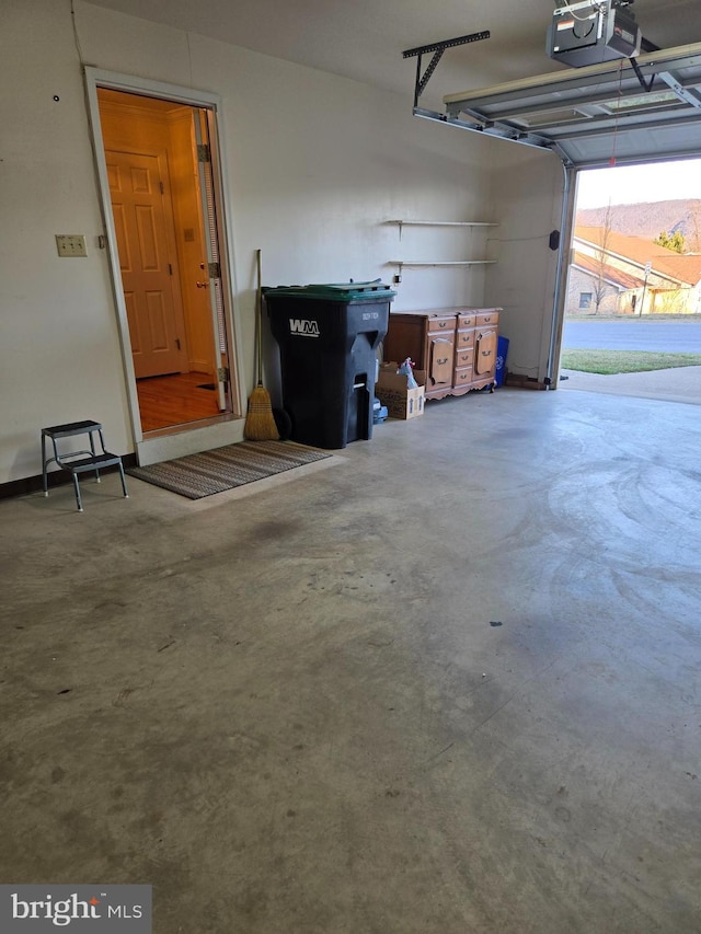 garage featuring a garage door opener