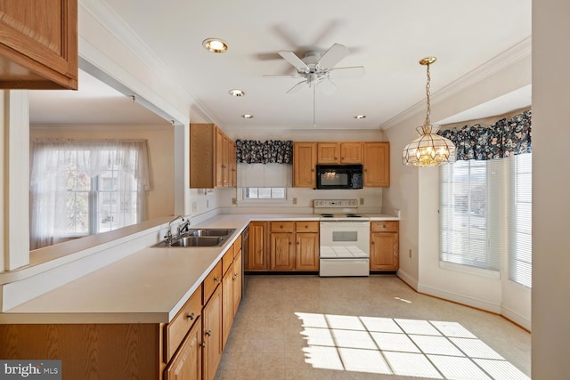 kitchen with a sink, light countertops, black microwave, and white electric range oven