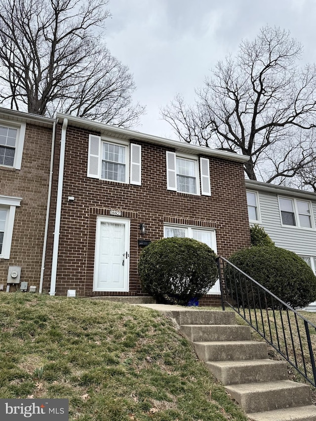 view of front of property with brick siding