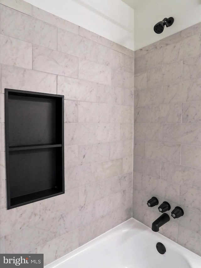 bathroom featuring bathing tub / shower combination