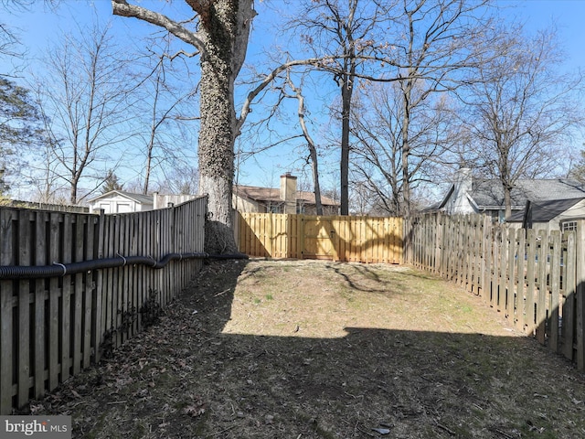 view of yard featuring a fenced backyard