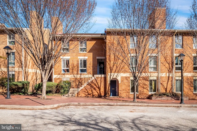 view of building exterior with stairs