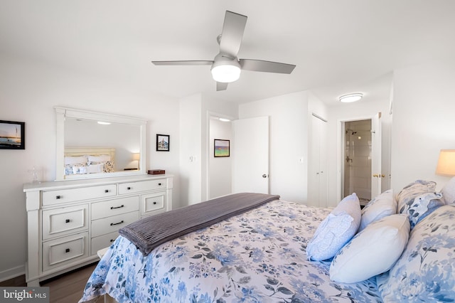 bedroom with dark wood-style flooring and a ceiling fan