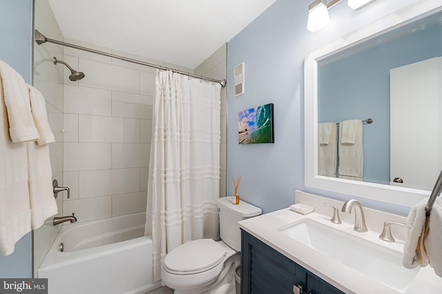 bathroom featuring toilet, shower / tub combo, visible vents, and vanity