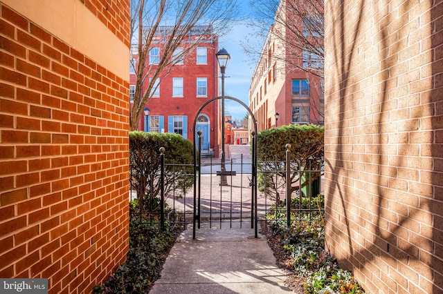 view of gate featuring fence