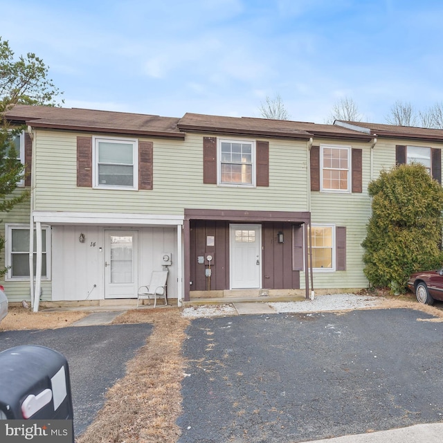 townhome / multi-family property featuring board and batten siding