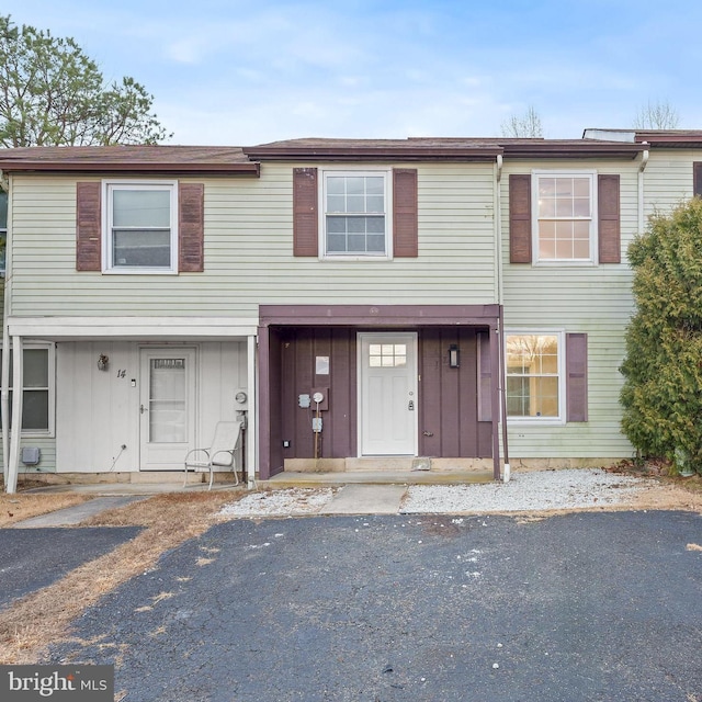 townhome / multi-family property featuring board and batten siding