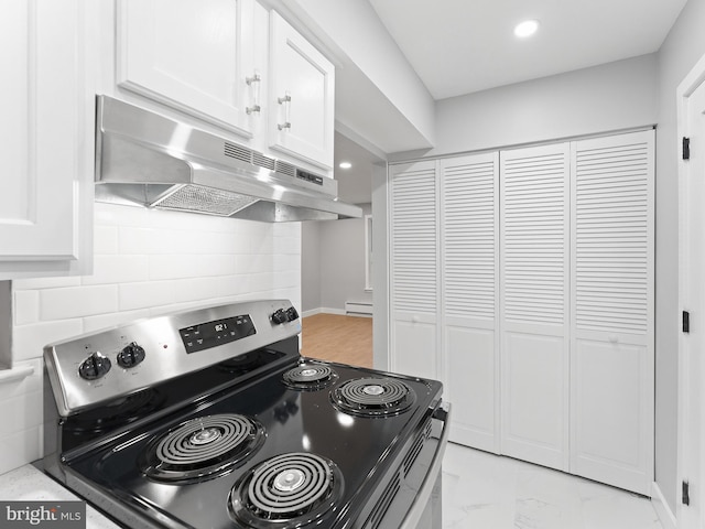 kitchen featuring marble finish floor, tasteful backsplash, electric range, white cabinets, and under cabinet range hood