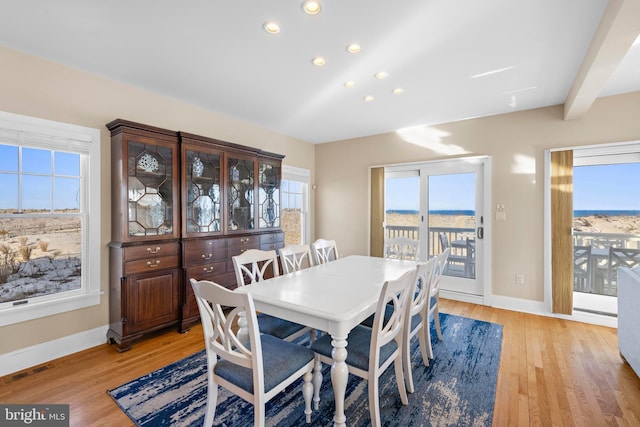 dining space with visible vents, beam ceiling, recessed lighting, light wood finished floors, and baseboards