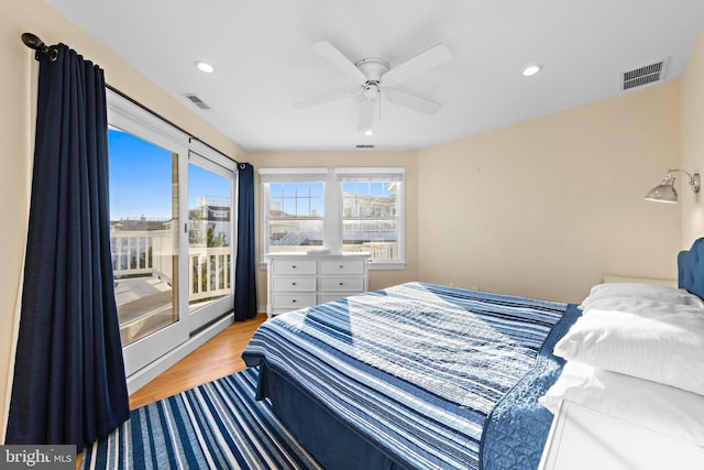 bedroom featuring recessed lighting, visible vents, wood finished floors, and a ceiling fan