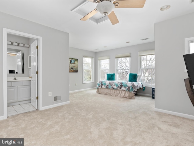 sitting room with baseboards, a ceiling fan, visible vents, and carpet