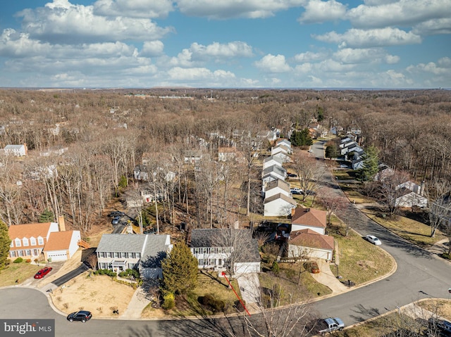 birds eye view of property with a residential view