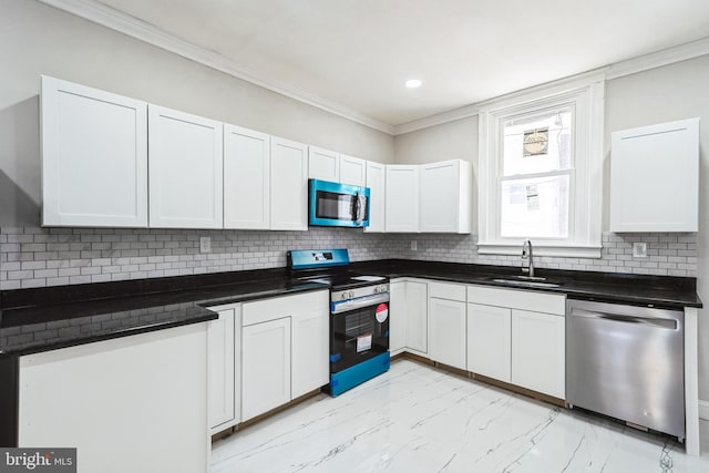 kitchen featuring marble finish floor, dark countertops, a sink, stainless steel appliances, and backsplash