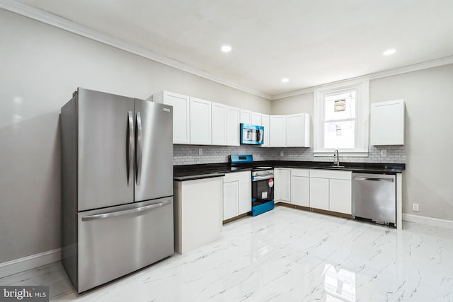 kitchen featuring dark countertops, recessed lighting, backsplash, marble finish floor, and appliances with stainless steel finishes