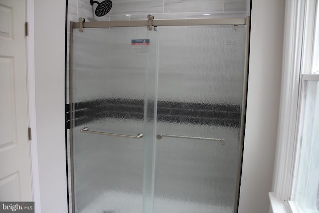 interior space featuring a stall shower