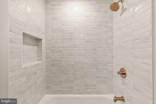 bathroom with shower / tub combination