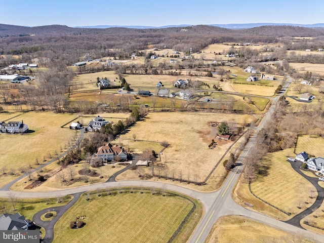 birds eye view of property featuring a rural view and a mountain view