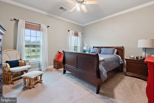 bedroom with visible vents, baseboards, carpet, and crown molding