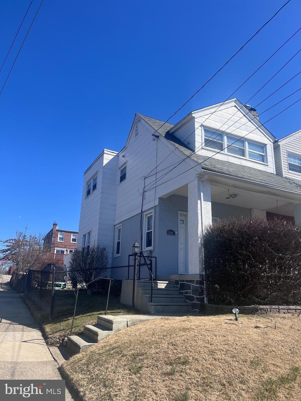 view of front of home with roof with shingles