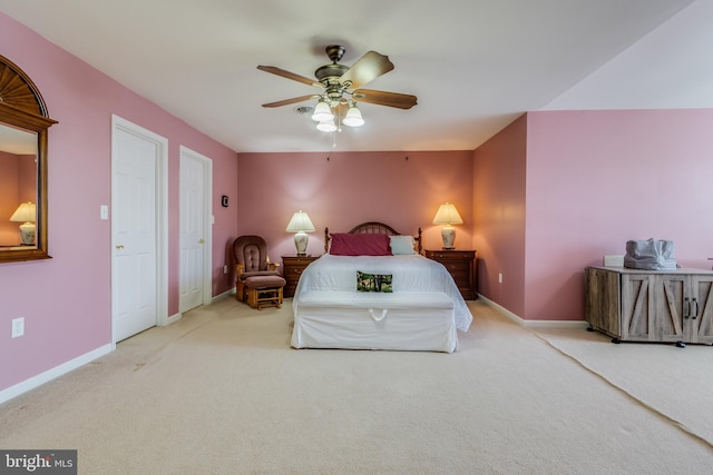 bedroom featuring a ceiling fan, carpet flooring, and baseboards