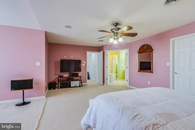 bedroom featuring a ceiling fan, carpet flooring, visible vents, and baseboards