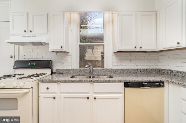 kitchen featuring white appliances, white cabinets, a sink, and under cabinet range hood