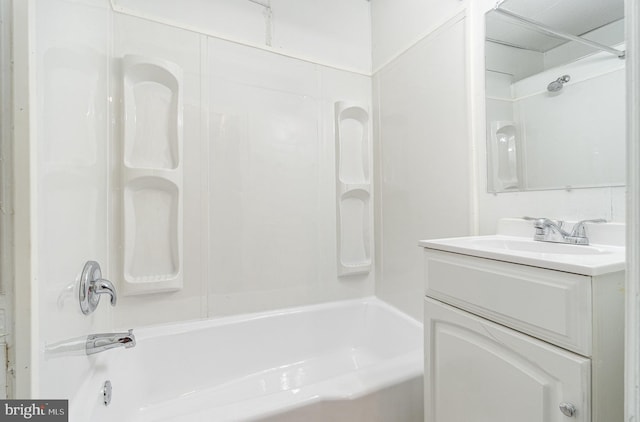 bathroom featuring shower / bath combination and vanity