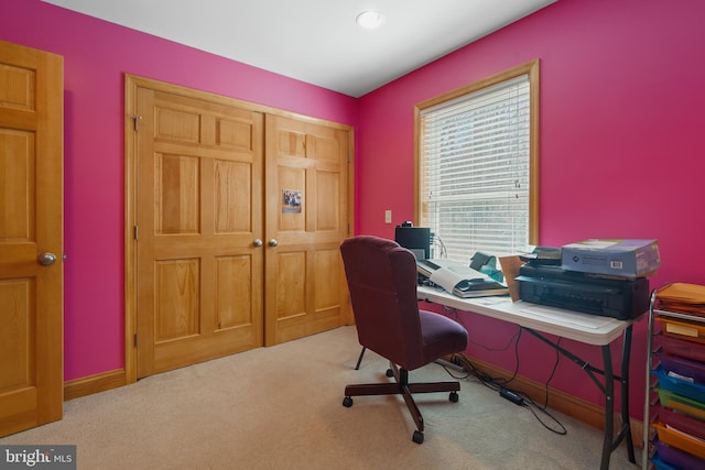 home office featuring carpet and baseboards